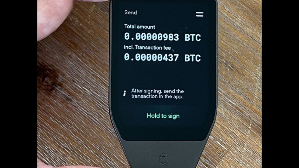 Verifying hardware-wallet firmware updates: version, source and recovery tests; editorial cover